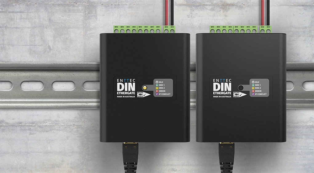Two ENTTEC DIN Ethergate gateways fitted on a TS35 DIN Rail with ethernet connected.